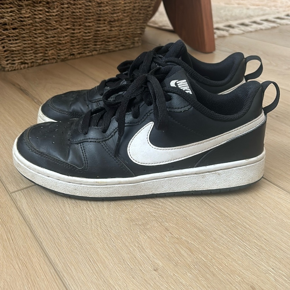 Black Nike boys court shoes